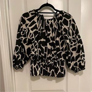 Zara Black and white peplum top NWOT size L